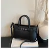 Bolso de Mano y Bolso Cruzado Transfronterizo 2026 Nuevo Estilo Francés Sencillo Texturizado, Bolso Versátil de Cuero PU de Moda para Viajes al Trabajo Nicho para Mujer