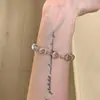 Pulseira Transparente Popular de Cristal Branco do Xiaohongshu para Mulheres, Estilo Princesa Elegante, Joia Versátil e Única de Nicho, Pulseira que Realça o Tom da Pele