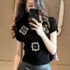 Camiseta Pulôver Bordada com Padrão Preto Estilo Francês de Manga Curta para o Verão de 2026, Top de Tricô Único e Exquisito