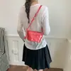 Bolso cubeta de color de bloque de lunares de nicho transfronterizo, bolso de hombro moderno y a la moda, bolso cruzado diario coreano de nicho dulce y elegante