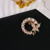 Broche Transfronterizo Nuevo de Alta Gama Lazo Insecto Flor Femenino Anti-Exposición Fijo Ropa Versátil Corsage