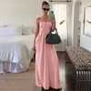 Ropa de Mujer Transfronteriza Europea y Americana Verano 2026 Nueva Moda Estilo Vacacional Color Sólido Cuello Halter Espalda Descubierta con Lazo Vestido Venta al por Mayor