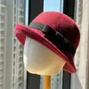 Chapéu de feltro de lã estilo Hepburn com aba redonda para mulheres outono e inverno casual versátil estilo garota rica faz o rosto parecer menor chapéu balde moderno