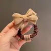Acessório de Cabeça com Laço Cor de Curry Outono e Inverno Coreano Laço de Pelúcia para Cabelo Corda de Cabelo Tira de Couro de Inverno Corda de Cabelo Feminina Popular na Internet ins Corda de Cabelo