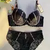 Lencería sexy popular de comercio exterior para mujer, estampado de leopardo fino, conjunto de lencería de encaje con bloques de color, soporte lateral para el pecho, conjunto de lencería push-up talla grande