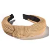 Accesorios para el cabello de tela de ala ancha de estilo europeo y americano, diadema con nudo, horquilla antideslizante sencilla para mujer, diadema con estampado de leopardo que combina con todo.