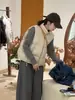 Nuevo Chaleco Ligero de Plumón con Cuello Alto Estilo Coreano para Mujer Otoño e Invierno Prenda Exterior Pequeña Chaleco Espesado de Plumón de Pato Blanco Moderno