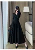 Vestido Negro tipo Polo de Manga Larga con Cremallera y Pliegues Estilo Hepburn Francés para Mujer Otoño Persona Alta Cintura Ceñida Dobladillo Ancho Falda Larga