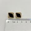 Exquisitos pendientes de diamantes negros para mujer, nuevos pendientes de estilo frío, diseño de nicho, luz explosiva, pendientes de lujo de alta gama.