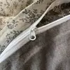 Juego de cuatro piezas de algodón jacquard teñido en hilo suave y arrugado, amigable con la piel, suave, estampado floral vintage, sábanas y ropa de cama lavadas