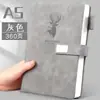 Cuaderno de negocios A5 al por mayor de cuero con hebilla, bloc de notas grueso de alto valor, cuaderno B5 pequeño.