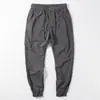 Pantalones de Verano para Hombre Delgados Sencillos Pierna-punta Sueltos Casuales Modernos Marca Elásticos Seda de Hielo Secado Rápido Pantalones Deportivos para Hombre