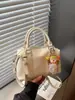 Bolsa Boston de Design de Nicho Feminina 2026 Nova Bolsa de Mão de Alto Padrão para o Trabalho Bolsa de Ombro Único Transversal Bolsa Almofada