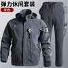 Conjunto de ropa de trabajo elástica resistente al desgaste para primavera y otoño transfronterizo para hombres, ropa de trabajo de camuflaje multibolsillo, traje protector cálido y resistente a la suciedad