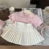 Estilo Coreano Niña 2026 Verano Nuevo Dulce y Elegante Punto Polo Manga Corta Versátil Falda Plisada Conjunto de Dos Piezas Moderno