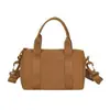 Mochila Pequeña Bolsa de Maquillaje 2026 Modelo Nuevo Bolso Boston Simple Tipo Almohada Bolso de Hombro Versátil Bolso Cruzado Bolso de Mano Urbano