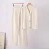 Conjunto de Duas Peças de Tricô Feminino Verão Europeu e Americano Botão Dourado Decote V Colete de Tricô Calça Solta Casual
