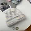 Jiuyue pick siete ~ suave suave transfronterizo nicho con lana degradado vuelta arriba gorro de lana tejido gorro frío simple invierno
