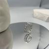 Anillo Estrella Mismo Estilo para Mujer Este Año Moda Simple Brillante Hueco T Nicho Estilo de Diseñador ins Anillo de Dedo para Hombre