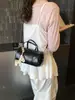 Bolso Cruzado de Hombro Único Modelo Nuevo 2026 para Mujer para el Trabajo y los Viajes Diarios, de Gama Alta, Color Sólido con Colgante Lindo, Bolso de Moda y Versátil