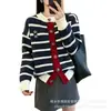 Suéter de punto de cuello redondo, de un solo pecho, prenda exterior para mujer, estilo europeo y americano transfronterizo, diseño de bloques de color a rayas, suave y cómodo, corte holgado, cárdigan de color contrastante