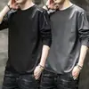 Temporada de primavera y otoño, camiseta lisa de manga larga popular, corte holgado, cuello redondo, camiseta interior para hombre, top simple y versátil