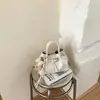 Bolso de Mano Super Popular Estilo Coreano para Mujer 2026 Nuevo Versátil Casual Bolso de Hombro Nicho Versátil Bolso Cruzado Tipo Cubo