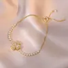 Colar para Mulheres, Estilo Influenciador Transfronteiriço Flor de Girassol Zircônia Rotativo Conjunto de Três Peças Decoração Colar de Aço Titânio
