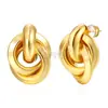 Pendientes de bobinado retro europeos y americanos chapados en oro al por mayor, aretes geométricos simples, pendientes de temperamento, moda, adecuados para varias ocasiones