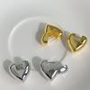 Pendientes de alta calidad con hebilla de oreja de metal de amor de 14 quilates de latón transfronterizo de Europa y Estados Unidos, joyería al por mayor para mujeres
