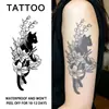 Gato negro y gris tatuaje floral pegatina simple blanco y negro patrón de planta gatito pegatina de brazo impermeable duradero decoración de foto