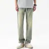 Elegantes pantalones de mezclilla lavada con pliegues para hombre, con un diseño retro, corte holgado, silueta fluida y corte de pierna ancha recta, perfectos para el verano.