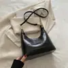Bolsa de Crowdsourcing de Sentido Avanzado para Multitudes Pequeñas para Mujer Otoño e Invierno 2024 Nueva Bolso de Hombro Cruzado Vintage Bolso Explosivo para el Trabajo y el Viaje Bolso Dumpling