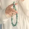 Flor flotante de Dunhuang Jade Blanco Raíz de Bodhi DIY Envejecimiento Grasa Manzana Cuentas sueltas Hombres y Mujeres Pulsera de doble anillo Pulsera Cuentas de Buda Venta al por mayor