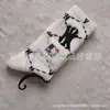 Nuevos calcetines estilo coreano para hombre y mujer bordados con letra NY calcetines deportivos LA calcetines casuales de caña alta a rayas de moda venta al por mayor