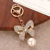 Nuevo Colgante Llavero de Lazo de Perla, Lujo Ligero y Exquisito Colgante de Bolso Completo de Diamantes, Accesorio para Llavero de Coche