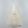 Bolsa de Tricô Nova de Cor Sólida Transfronteiriça para Mulheres, Bolsa de Ombro Vazada de Grande Capacidade para o Dia a Dia, Bolsa Versátil de Tecido Estilo Casual de Férias