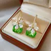 Agujas de Plata de Ley s925 Moda Elegante Cristales Verdes Muy Brillantes Pedrería Flor Cierres de Pendiente para Mujer Personalidad Exagerada Puños de Oreja Únicos para Mujer