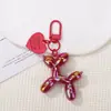 Chaveiro de cachorro de balão de gelatina em formato de coração resina desenho animado pingente fofo acessório colorido divertido atacado para vendedores de rua