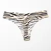 Ropa interior sexy de estampado de leopardo europeo y americano para mujer, sin entrepierna, cómoda, de seda helada, sin costuras, transpirable, de cintura baja, adhesiva para mujer temu