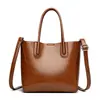 Bolso Nuevo para Mujer 2025 Textura Simple Bolso Literario Bolso Cubo de Cuero Suave Bolso de Hombro Cruzado para Mujer Moda Bolso para Mujer