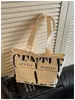 Bolsa de mão artística com estampa de letras estilo japonês, bolsa de lona simples e casual de grande capacidade para o dia a dia, bolsa de ombro para estudantes para a aula e o trajeto