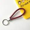 Llavero creativo llavero de cuerda de cuero cordón para llaves colgante de joyería cordón tejido fábrica de cuerda de cuero venta al por mayor