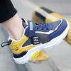 Zapatos para Niños 2026 Primavera Nuevos Zapatos Deportivos de Malla para Niños Zapatos para Niños Medianos y Grandes Malla Transpirable Primavera/Verano Zapatos al por Mayor