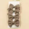 Venta caliente combinación transfronteriza comercio exterior hecho a mano para niños cola de milano nudo simple ángulo flotante costilla de gofre cinta lazo accesorios para el cabello