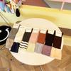 Outono e Inverno algodão absorvente de suor meias femininas Meias de pilha da moda japonesa estilo universitário JK uniforme meias de bezerro meias de correspondência de cores