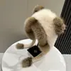Venta al por mayor 25 Años de Otoño e Invierno Nuevos Sombreros de Felpa Disparados Realmente, Orejas de Oso de Dibujos Animados Lindas, Colores Contrastantes, Cálidos Sombreros Lei Feng con Protección para los Oídos