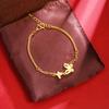 Pulsera de oro vietnamita estilo palacio pulsera de mariposa de seda perla sintética para mujer retro no se decolora a largo plazo primera joyería al por mayor