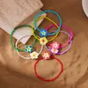 Nuevo Pulsera de Plumeria Estilo Bohemio de Resort Transfronterizo Europeo y Americano Versátil Flor de Arcilla Suave Pulsera de Cuentas de Arroz para Mujer