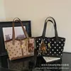 Estampado de lunares retro, nueva colección de otoño 2026, bolso de gran capacidad para el día a día, bolso de axila de nicho, bolso de hombro y bolso tote